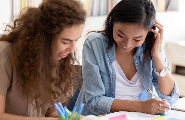 TeenageGirlsWorkingTogether